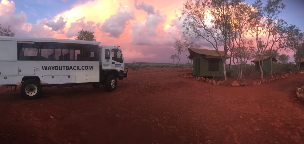 WOB bus, fixed tent and sunset